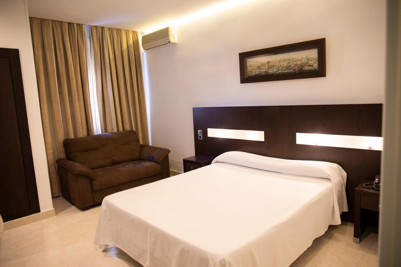 Hotel El Meson ตอร์ริโคส ภายนอก รูปภาพ