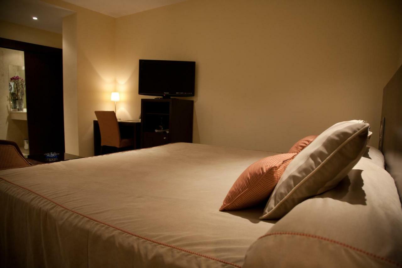 Hotel El Meson ตอร์ริโคส ภายนอก รูปภาพ